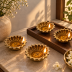Swastik Embossed Surya Brass Diya – Set of 4